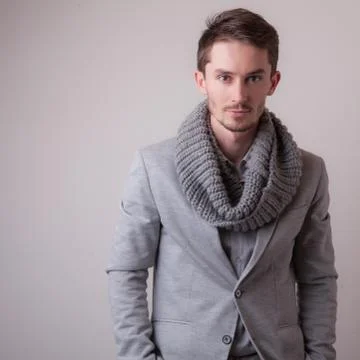 Handsome young elegant man studio portrait close-up. Stock Photos