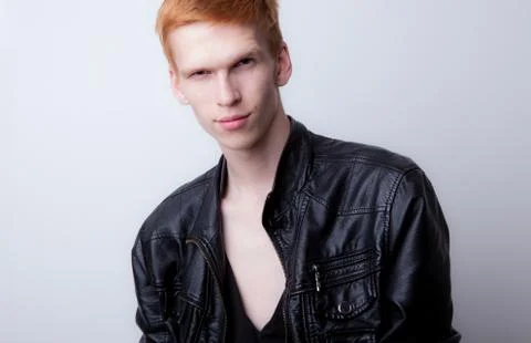 Handsome young elegant man studio portrait close-up. Stock Photos