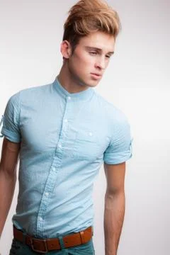 Handsome young elegant man studio portrait close-up. Stock Photos