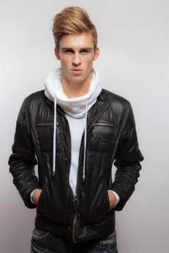 Handsome young elegant man studio portrait close-up. Stock Photos