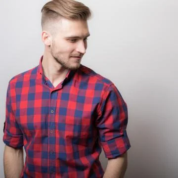 Handsome young elegant man studio portrait close-up. Stock Photos