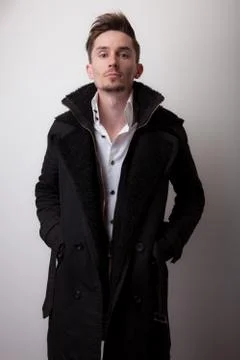 Handsome young elegant man studio portrait close-up. Stock Photos