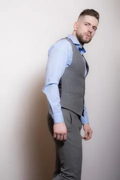 Handsome young elegant man studio portrait close-up. Stock Photos
