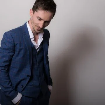 Handsome young elegant man studio portrait close-up. Stock Photos
