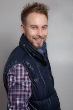 Handsome young elegant man studio portrait close-up. Stock Photos