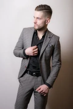 Handsome young elegant man studio portrait close-up. Stock Photos