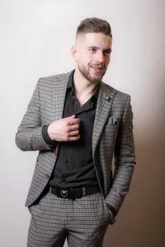 Handsome young elegant man studio portrait close-up. Stock Photos