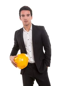 Handsome young engineer posing isolated over white background Stock Photos