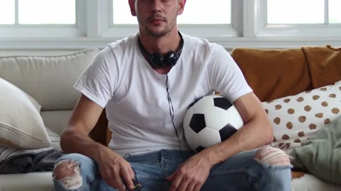 Handsome young excited  while watching football. Stock Footage 163088151
