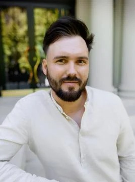 Handsome young guy with a bearded man in a linen shirt Stock-Fotos
