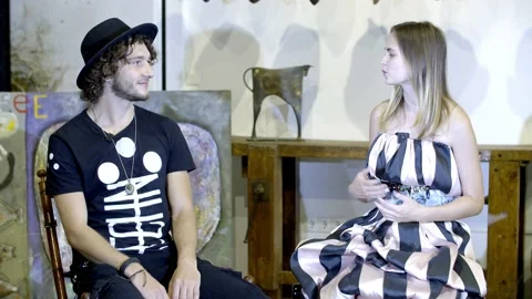 Handsome young guy gives interview in studio Stock Footage 138882385