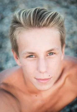 Handsome young guy in the park Stock Photos