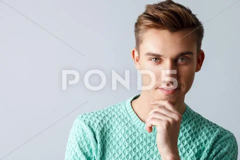 Handsome young guy is showing his sexuality Stock Photos