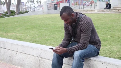 Handsome Young Male Using Cellphone Stock-Footage 71157780