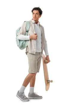 Handsome young man with backpack and skateboard on white background Stock Photos
