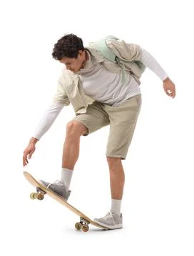 Handsome young man with backpack riding skateboard on white background Stock Photos