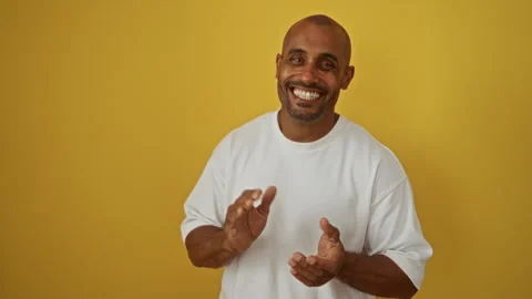Handsome young man clapping and smiling over isolated yellow background emp.. Stock Footage 285721594
