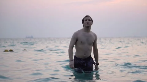 Handsome Young Man Diving Into Water of Ocean Stock Footage 126258718