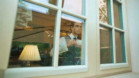 Handsome young man drinks coffee Stock Footage 62945099