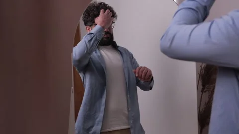Handsome young man getting ready for the day Stock-Footage 346989714