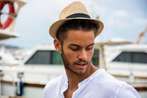 Handsome young man in hat Stock-Fotos