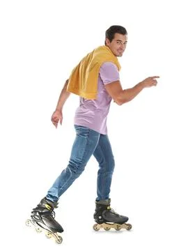 Handsome young man with inline roller skates on white background Stock Photos