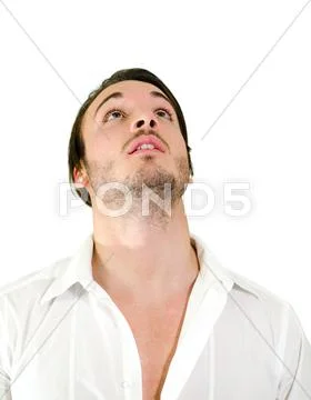 Handsome young man looking up Stock Photos