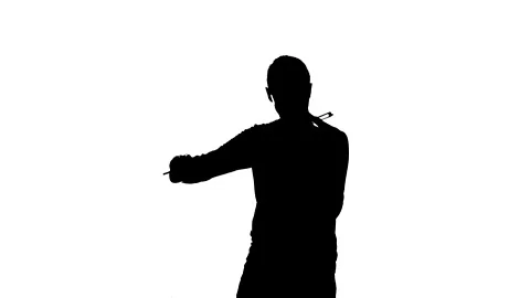Handsome young man playing an electric violin. Medium long shot. Silhouette Stock Footage 134522337