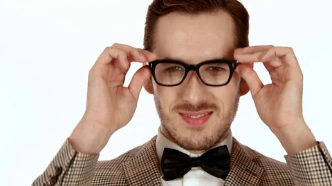 Handsome young man posing with glasses Video stock 72035157