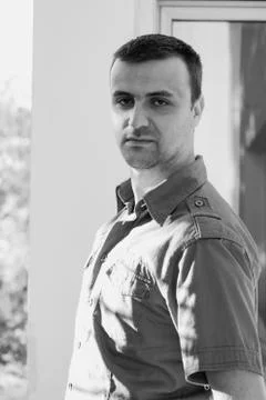 Handsome young man posing outdoor nature Stock Photos