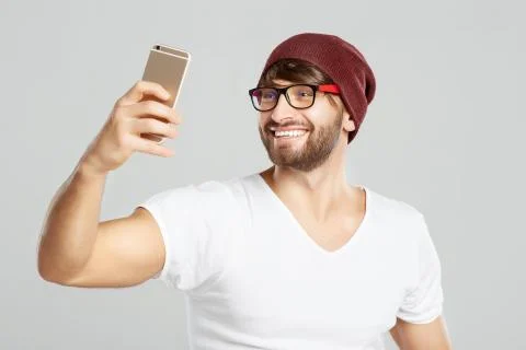 Handsome young man posing at studio Stock Photos