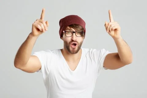 Handsome young man posing at studio Stock Photos