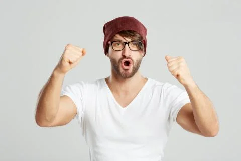Handsome young man posing at studio Stock Photos