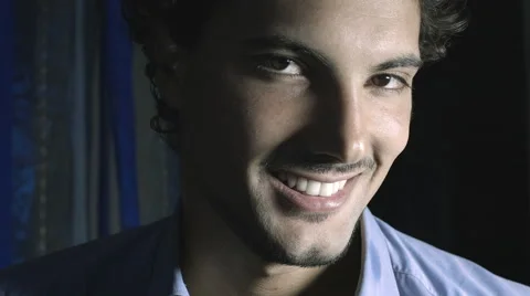 Handsome young man preparing to go out and perfumes himself Stock Footage 47829502