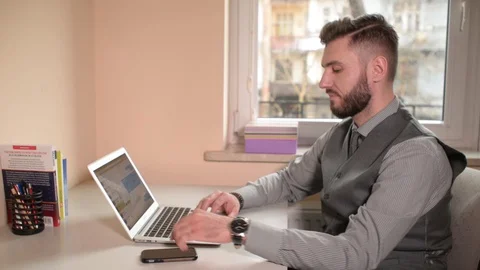 Handsome young Man Programer Working With His Laptop At The Office Stock Footage 85842053