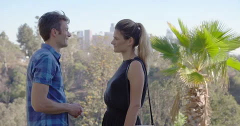 Handsome young man proposing to girlfriend in Los Angeles 4K Stock Footage 67829682