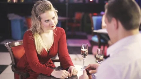 Handsome young man proposing to his girlfriend Stock Footage 74955530