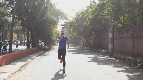 Handsome young man resting  after running and jogging Stock Footage 113731067