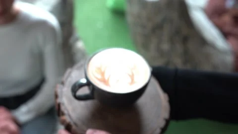 Handsome Young Man Smiling To The Camera While Enjoying His Coffee At The Cafe Video stock 196167191