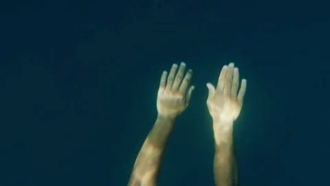 Handsome Young Man Swimming in Slow Motion Underwater Shot Musicular Build Stock Footage