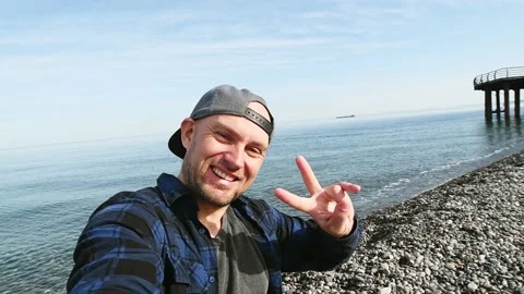 Handsome young man taking selfie portrait on summer vacation - Happy travel.. Stock-Footage 239380237