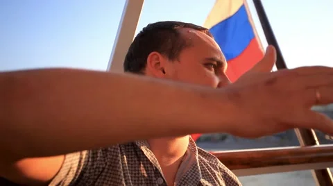 Handsome young man talking and relaxing on cruise ship. HD. 1920x1080 Stock Footage 47052104
