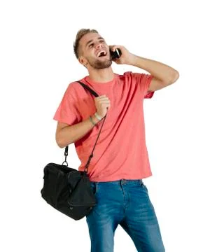 Handsome young man using a smartphone. Stock Photos