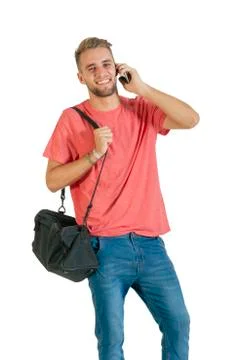 Handsome young man using a smartphone. Stock Photos
