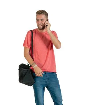 Handsome young man using a smartphone. Stock Photos