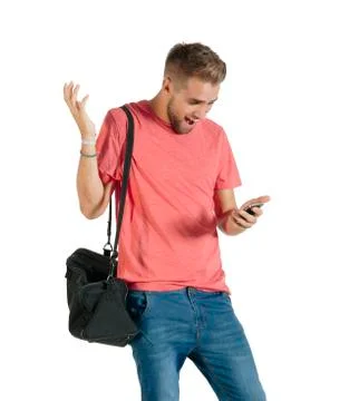 Handsome young man using a smartphone. Stock Photos
