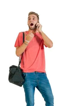 Handsome young man using a smartphone. Stock Photos