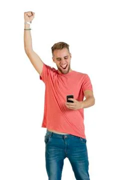 Handsome young man using a smartphone. Stock Photos