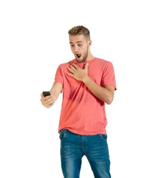 Handsome young man using a smartphone. Stock Photos