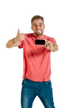 Handsome young man using a smartphone. Stock Photos